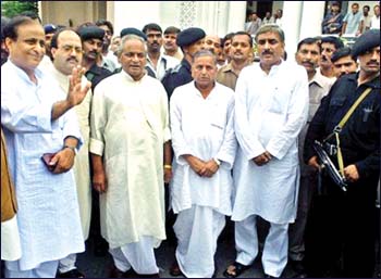 Standing from Left to Right – Azam Khan, Amar Singh, Kalyan Singh, Mulayam Singh Yadav and a SP leader